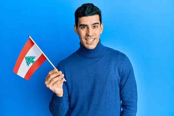 Handsome Hispanic Man Holding Lebanon Flag Looking Positive Happy Standing — Stockfoto