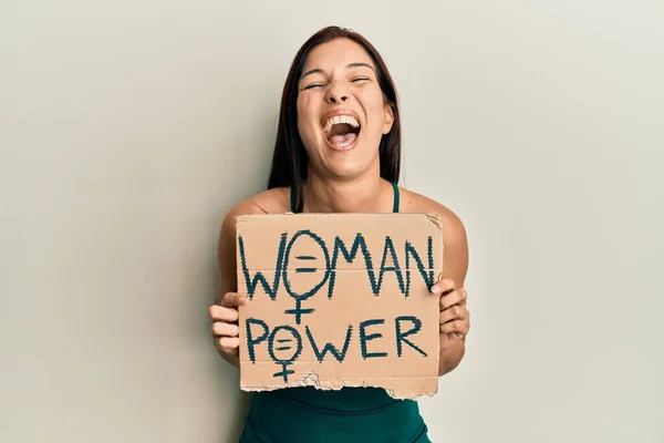 Young Latin Woman Holding Woman Power Banner Smiling Laughing Hard — Stockfoto