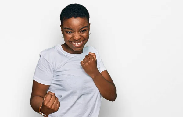 Young African American Woman Wearing Casual White Shirt Celebrating Surprised — ストック写真