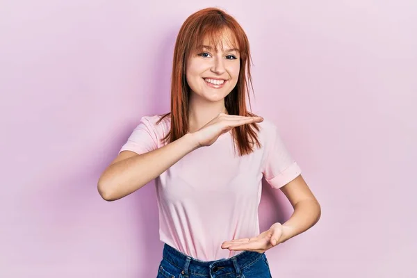 Redhead Young Woman Wearing Casual Pink Shirt Gesturing Hands Showing — 图库照片