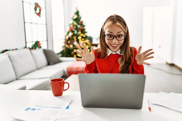 Young Caucasian Girl Sitting Table Working Using Laptop Christmas Tree —  Fotos de Stock