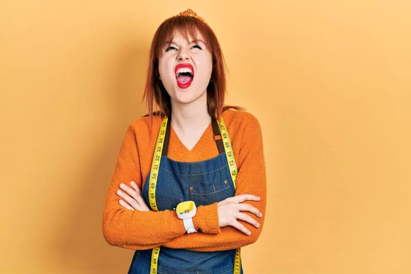 Redhead Young Woman Dressmaker Designer Wearing Atelier Apron Angry Mad — Stock Photo, Image