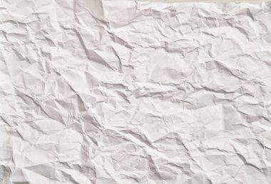 Kırışıklıkları olan beyaz buruşuk kağıt dokusu. Hasarlı ve yırtık çarşaf