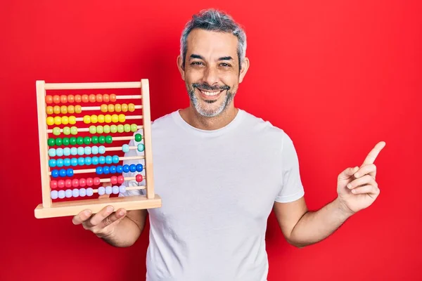Handsome Middle Age Man Grey Hair Holding Traditional Abacus Smiling — Stock Fotó