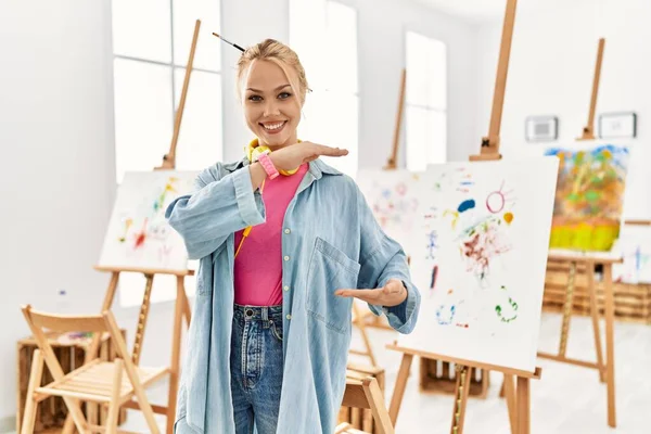 Young Caucasian Girl Art Studio Gesturing Hands Showing Big Large — ストック写真