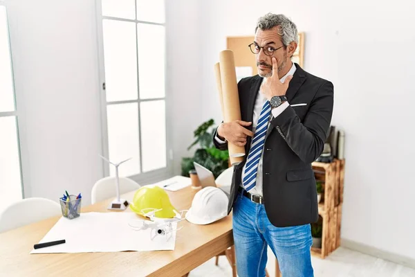 Middle Age Hispanic Business Man Holding Paper Blueprints Pointing Eye — Stockfoto