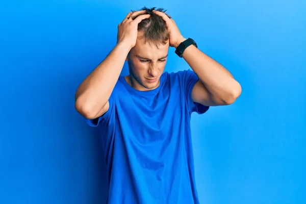 Young Caucasian Man Wearing Casual Blue Shirt Suffering Headache Desperate — Foto Stock