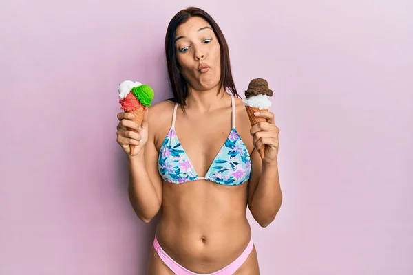 Young Latin Woman Wearing Bikini Holding Ice Cream Making Fish —  Fotos de Stock