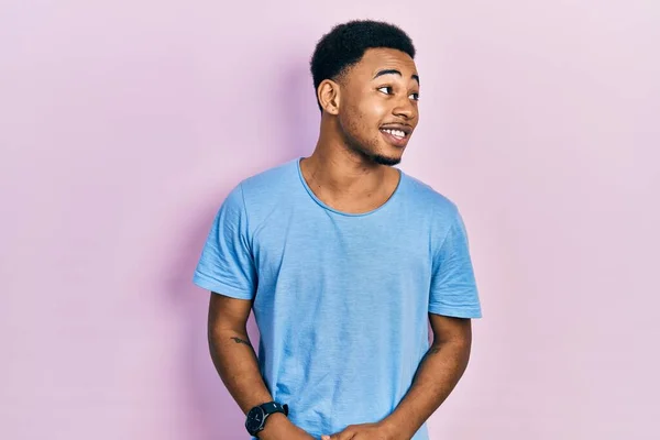 Young African American Man Wearing Casual Blue Shirt Looking Away — Fotografia de Stock