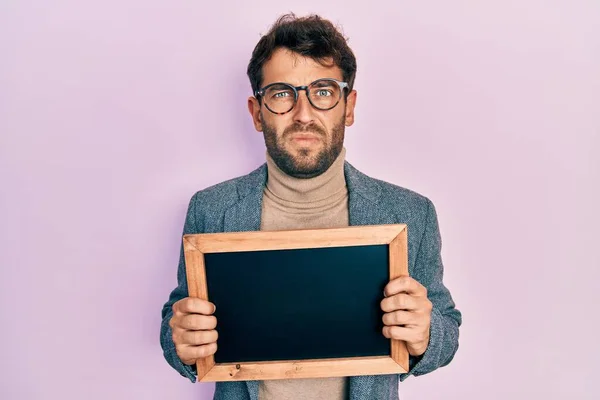 Handsome Man Beard Holding Blackboard Clueless Confused Expression Doubt Concept — Foto de Stock