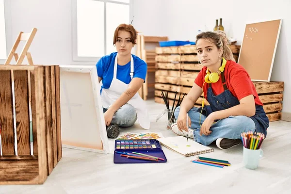 Two Beautiful Women Painting Art Studio Thinking Attitude Sober Expression — Foto de Stock