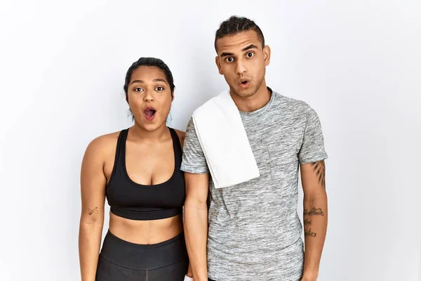 Young Latin Couple Wearing Sportswear Standing Isolated Background Afraid Shocked — Foto de Stock