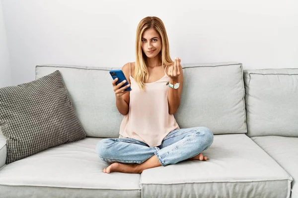 Blonde Beautiful Young Woman Sitting Sofa Home Using Smartphone Doing —  Fotos de Stock
