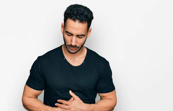 Hispanic Man Beard Wearing Casual Black Shirt Hand Stomach Because — Stock fotografie