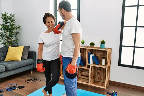 Middle Age Hispanic Couple Smiling Happy Training Boxing Home — ストック写真