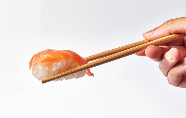 Chopsticks Holding Single Salmon Nigiri Sushi Isolated White Background — Stock Photo, Image