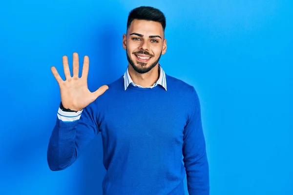 Young Hispanic Man Beard Wearing Casual Blue Sweater Showing Pointing — Stock Photo, Image