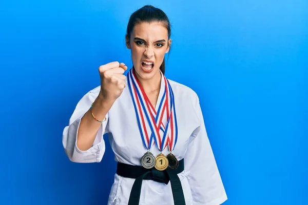 Beautiful Brunette Young Woman Wearing Karate Fighter Uniform Medals Annoyed — Fotografia de Stock