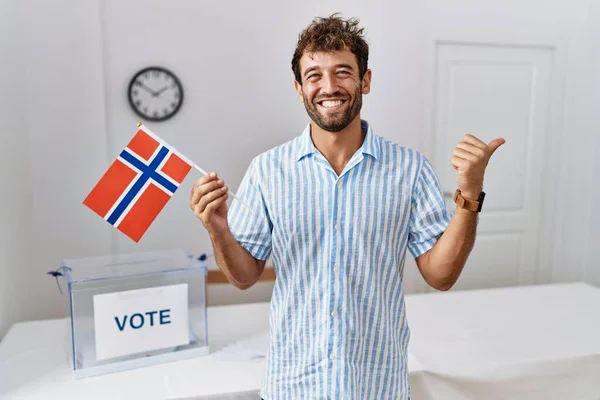 Young Handsome Man Political Campaign Election Holding Norway Flag Pointing — Foto de Stock