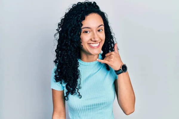 Young Hispanic Woman Curly Hair Wearing Casual Blue Shirt Smiling — Stockfoto