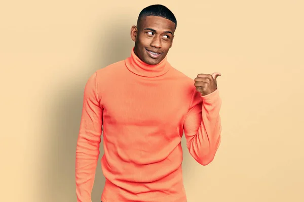 orange turtle neck men