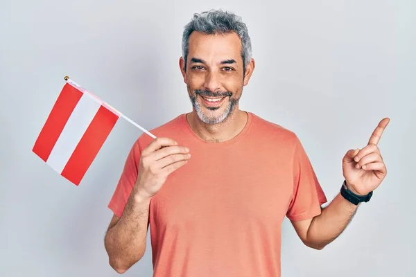 Handsome Middle Age Man Grey Hair Holding Austria Flag Smiling — 스톡 사진