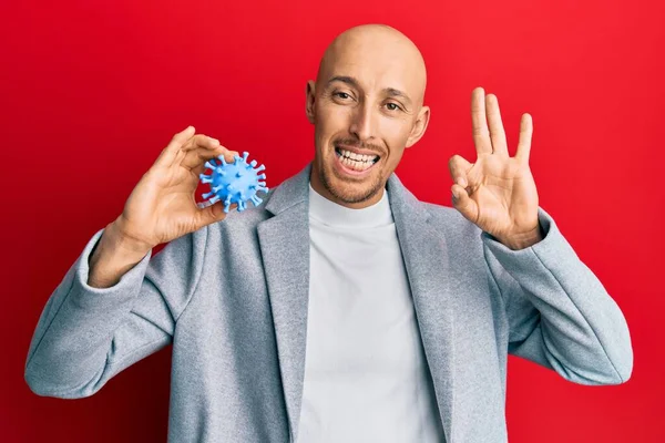 Bald Man Beard Holding Virus Toy Doing Sign Fingers Smiling — Fotografia de Stock