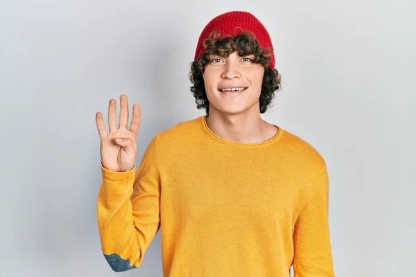 Handsome Young Man Wearing Wool Hat Showing Pointing Fingers Number — Stock fotografie