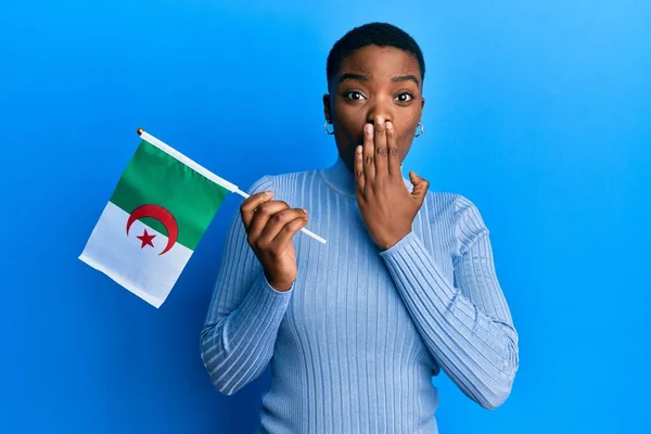 Young African American Woman Holding Algeria Flag Covering Mouth Hand — Fotografia de Stock