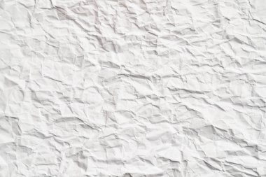 Kırışıklıkları olan beyaz buruşuk kağıt dokusu. Hasarlı ve yırtık çarşaf