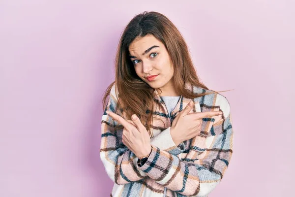 Young Caucasian Girl Wearing Casual Clothes Pointing Both Sides Fingers — Stock Photo, Image