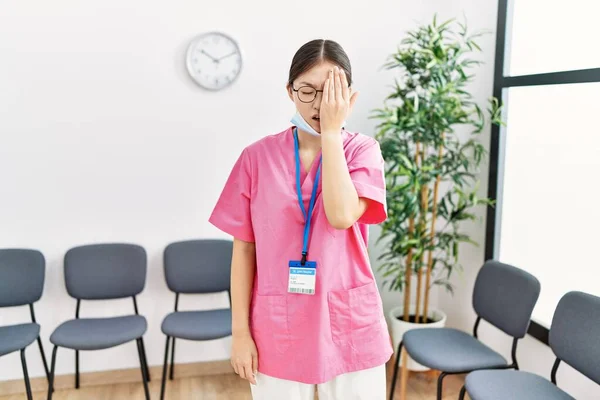 Young Asian Nurse Woman Medical Waiting Room Yawning Tired Covering — Fotografia de Stock