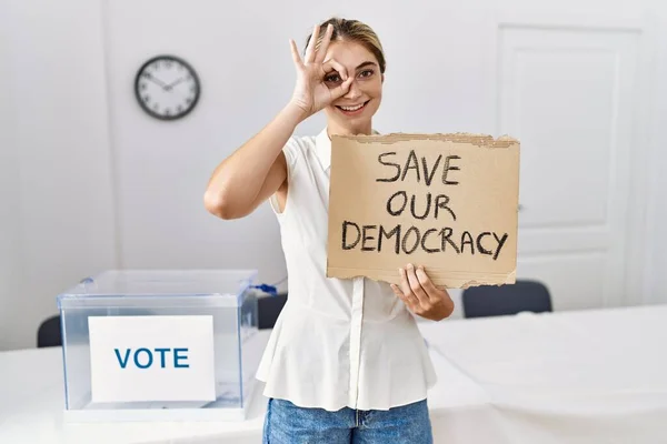 Young Blonde Woman Political Election Holding Out Democracy Banner Smiling — Fotografia de Stock