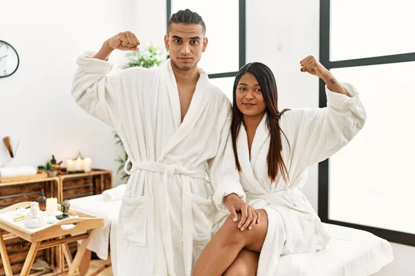 Young Latin Couple Wearing Towel Standing Beauty Center Strong Person — Stockfoto