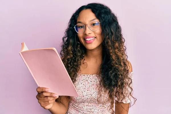 Young Latin Woman Reading Book Glasses Looking Positive Happy Standing — Stockfoto