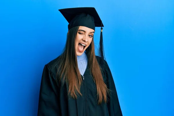 Beautiful Brunette Young Woman Wearing Graduation Cap Ceremony Robe Winking — Stockfoto
