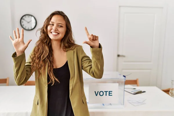Beautiful Hispanic Woman Standing Political Campaign Room Showing Pointing Fingers — Foto Stock