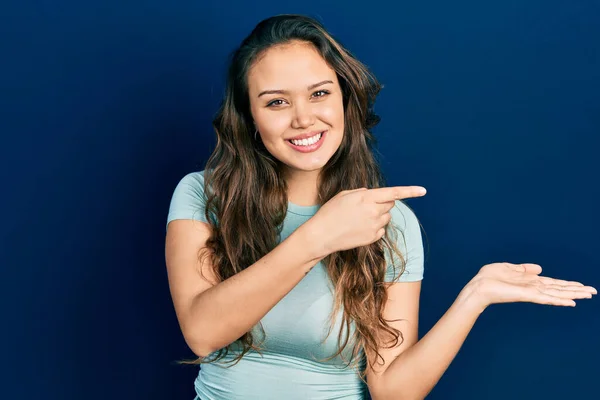 Young Hispanic Girl Wearing Casual Clothes Amazed Smiling Camera While — Stock Photo, Image