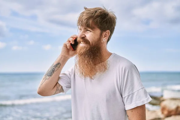 Young Redhead Man Smiling Happy Talking Smarphone Beach — Stock Photo, Image