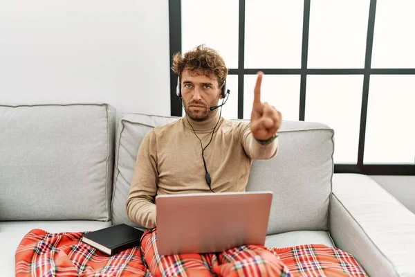 Young Handsome Man Beard Wearing Operator Headset Working Home Pointing — Stok fotoğraf