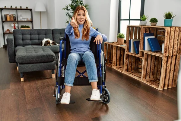 Young Beautiful Woman Sitting Wheelchair Home Smiling Friendly Offering Handshake — Stock Photo, Image