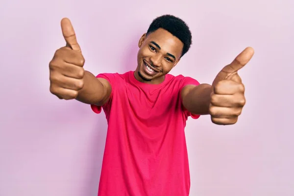 Young African American Man Wearing Casua Shirt Approving Doing Positive — стоковое фото