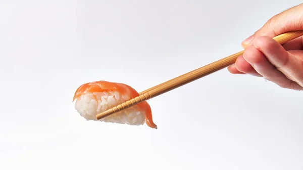 Chopsticks Holding Single Salmon Nigiri Sushi Isolated White Background — Stock Photo, Image