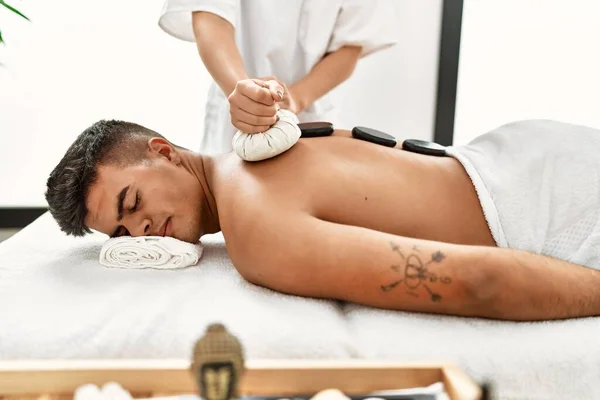 Young Hispanic Man Relaxed Having Back Massage Using Black Stones — Stock Photo, Image