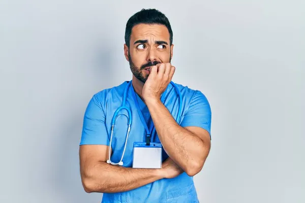 Handsome Hispanic Man Beard Wearing Doctor Uniform Looking Stressed Nervous — Stock Photo, Image