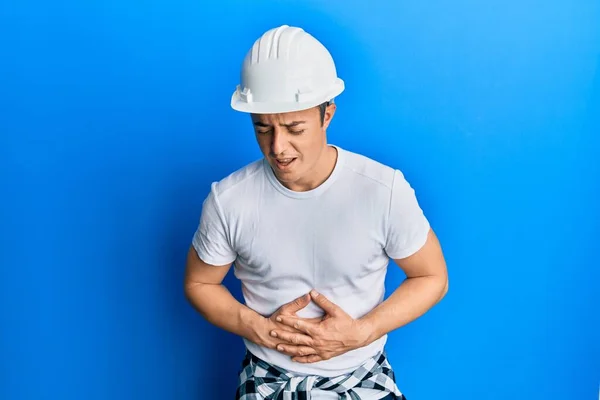 Handsome Young Man Wearing Builder Uniform Hardhat Hand Stomach Because — 스톡 사진