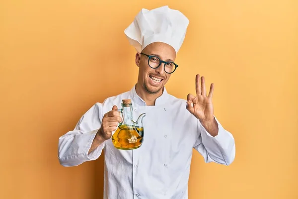 Bald Man Beard Wearing Professional Cook Apron Holding Olive Oil — 스톡 사진