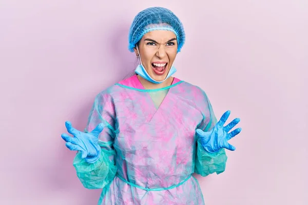 Young Brunette Woman Wearing Surgeon Uniform Medical Mask Crazy Mad — Foto Stock