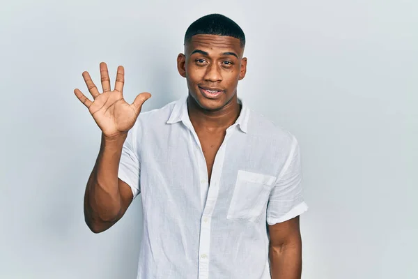 Young Black Man Wearing Casual White Shirt Showing Pointing Fingers — 图库照片