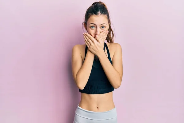 Young Brunette Woman Wearing Sportswear Shocked Covering Mouth Hands Mistake — Fotografia de Stock